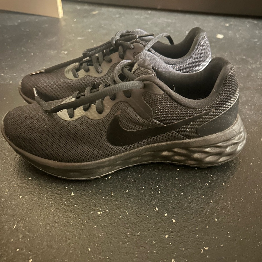 Black Nike sneakers extremely good condition worn once for dance recital.